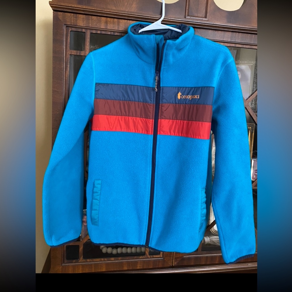 Cotopaxi Blue Fleece Jacket with Red and Navy Stripes